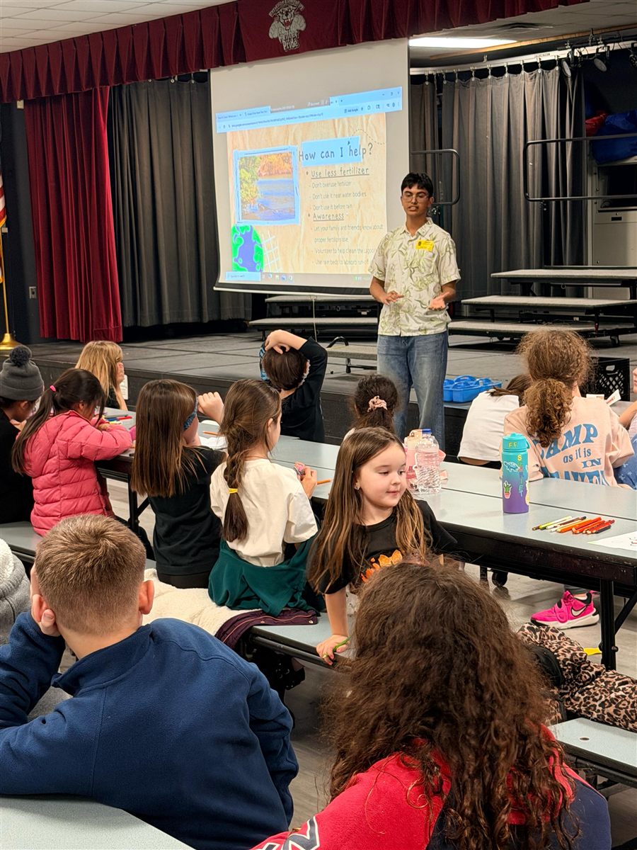 Students presenting lagoon conservation material in a Brevard County classroom