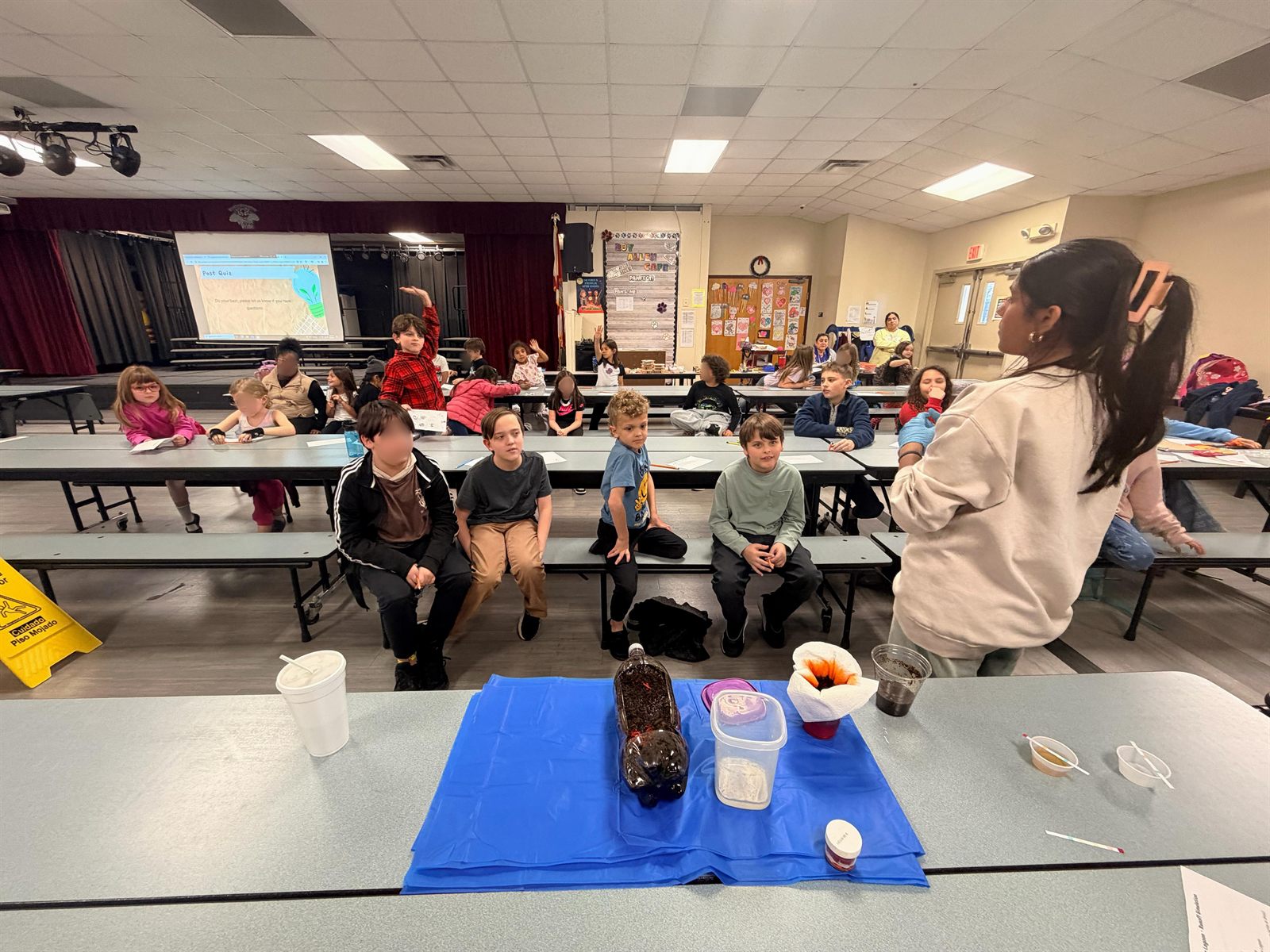 Students learning during a lagoon conservation classroom session